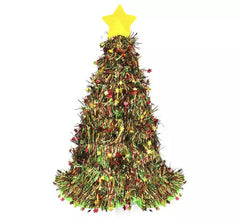Tappo d'oro scintillante dell'albero