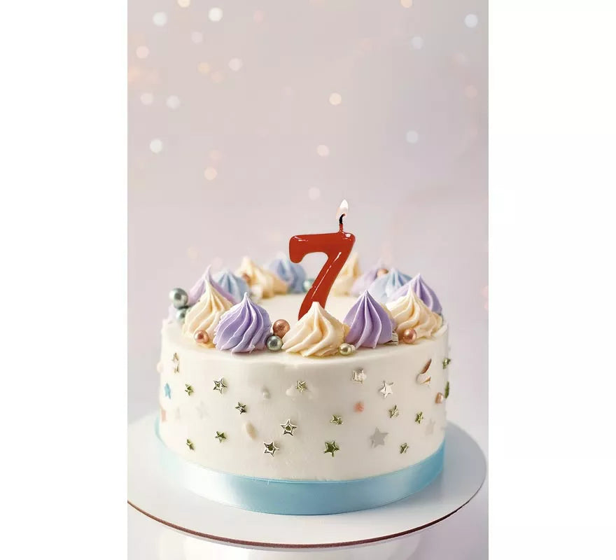 Translation missing: it.Vela roja con el número 7 para cumpleaños